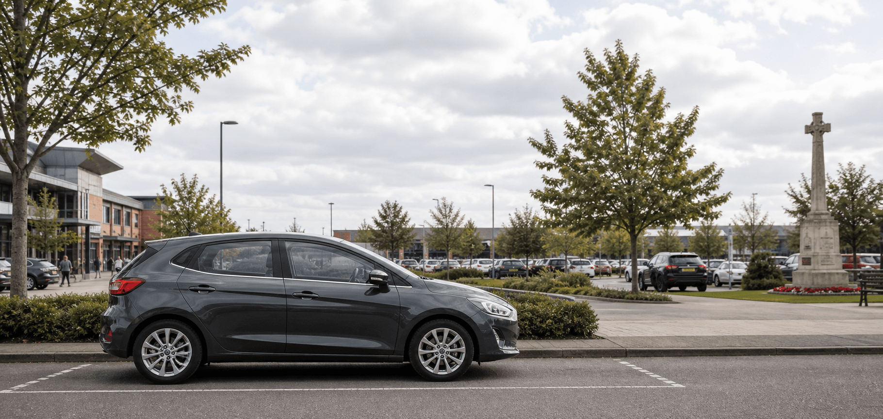 Compact hire car ready for practical travel around Egham